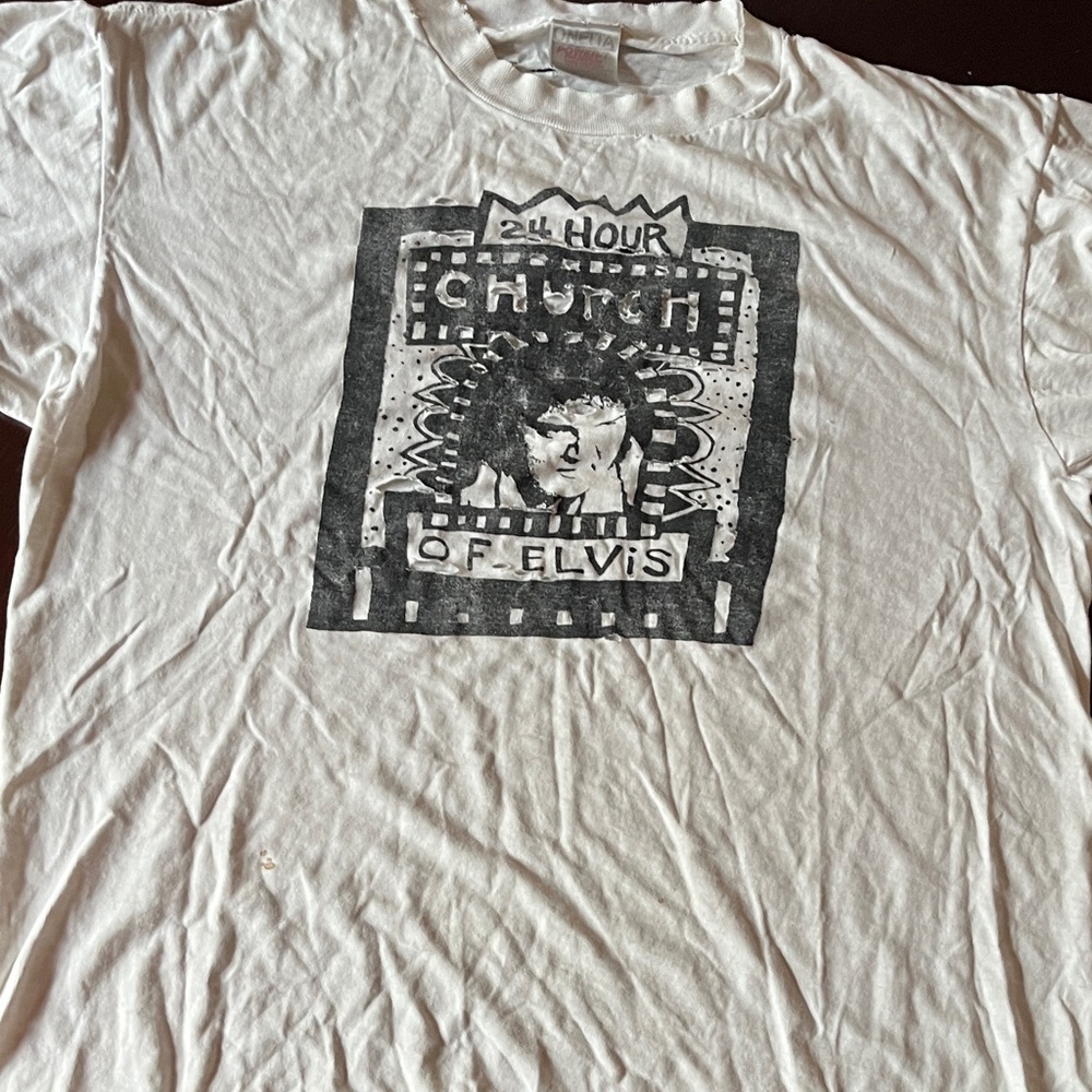 White Graphic vintage Church of Elvis t-shirt.